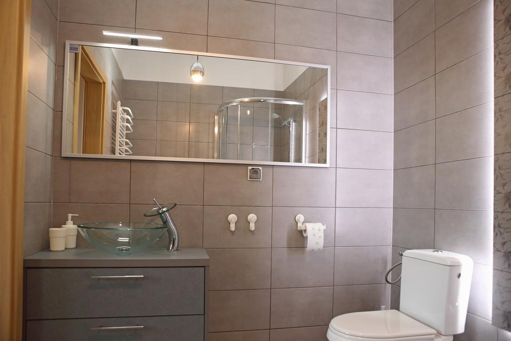 Apartamenty W Sercu Chelmna Хелмно Номер фото